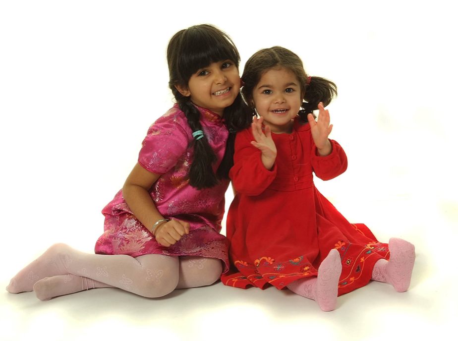 Two sisters sharing a smile